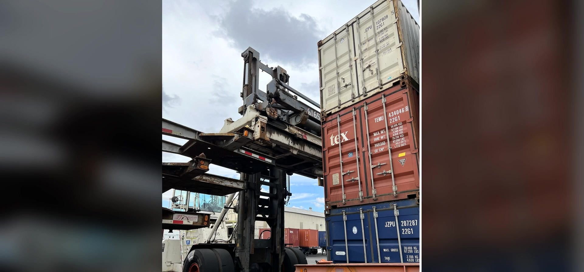 Secure storage yard with top handler